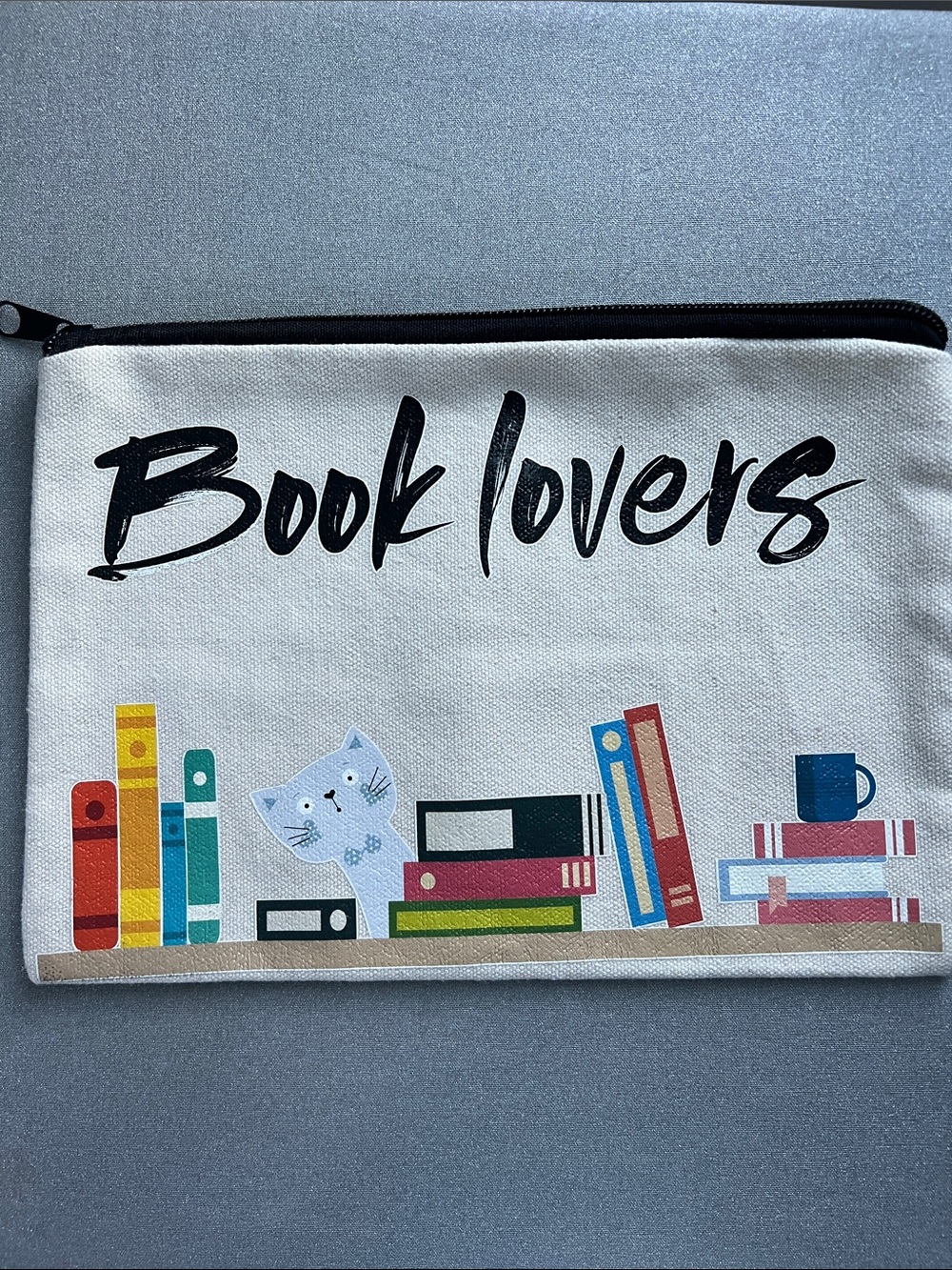 Book Lovers Canvas Zipper Pouch with Colorful Book Print Size 9” L x 6.5” W